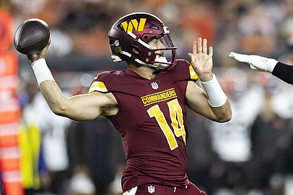 Aug 11, 2023; Cleveland, Ohio, USA; Washington Commanders quarterback Sam Howell (14) throws the ball against the Cleveland Browns during the first quarter at Cleveland Browns Stadium. Mandatory Credit: Scott Galvin-USA TODAY Sports