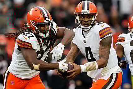 Dec 11, 2022; Cincinnati, Ohio, USA; Cleveland Browns quarterback Deshaun Watson (4) fakes a handoff to Cleveland Browns running back Kareem Hunt (27) in the fourth quarter during a Week 14 NFL game against the Cincinnati Bengals, Sunday, Dec. 11, 2022, at Paycor Stadium in Cincinnati. The Cincinnati Bengals won, 23-10. Mandatory Credit: Kareem Elgazzar-USA TODAY Sports