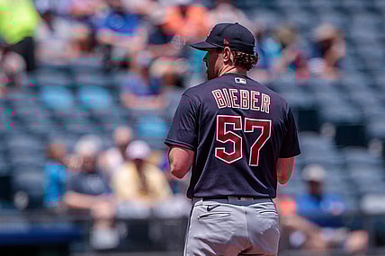 Jun 29, 2023; Kansas City, Missouri, USA; Cleveland Guardians starting pitcher Shane Bieber (57) on the mound during the first inning against the Kansas City Royals at Kauffman Stadium. Mandatory Credit: William Purnell-USA TODAY Sports