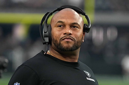Aug 26, 2022; Paradise, Nevada, USA; Las Vegas Raiders linebackers coach Antonio Pierce watches from the sidelines against the New England Patriots at Allegiant Stadium. The Raiders defeated the Patriots 23-6. Mandatory Credit: Kirby Lee-USA TODAY Sports