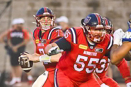 Jul 1, 2023; Montreal, Quebec, CAN; Montreal Alouettes quarterback Cody Fajardo (7) against the Winnipeg Blue Bombers during the first quarter at Percival Molson Memorial Stadium. Mandatory Credit: David Kirouac-USA TODAY Sports