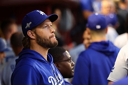 Oct 11, 2023; Phoenix, Arizona, USA; Los Angeles Dodgers starting pitcher Clayton Kershaw (22) in the dug out before during three of the NLDS for the 2023 MLB playoffs against the Arizona Diamondbacks at Chase Field. Mandatory Credit: Mark J. Rebilas-USA TODAY Sports