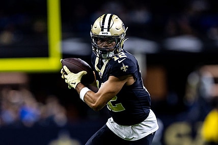 Dec 3, 2023; New Orleans, Louisiana, USA; New Orleans Saints wide receiver Chris Olave (12) catches a pass against the Detroit Lions during the first half at the Caesars Superdome. Mandatory Credit: Stephen Lew-USA TODAY Sports