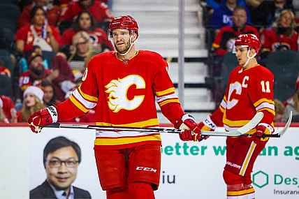 Dec 27, 2023; Calgary, Alberta, CAN; Calgary Flames center Jonathan Huberdeau (10) during the first period against the Seattle Kraken at Scotiabank Saddledome. Mandatory Credit: Sergei Belski-USA TODAY Sports