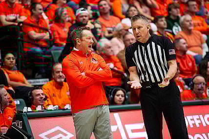 Colorado State's head coach Nico Medved talks with an offical during a game against UNLV at Moby Arena in Fort Collins, Colo., on Friday, Jan. 19, 2024.