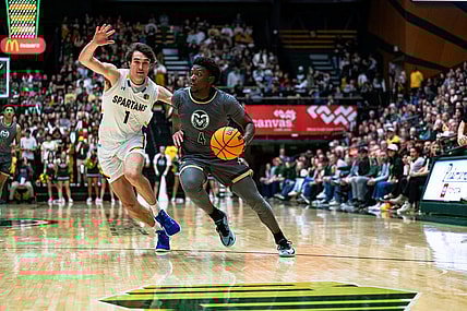 Colorado State University's 
 Isaiah Stevens (4) drives towards the basket during their game against San Jose State at Moby Arena on Friday, Feb. 9. Rams win 66-47.