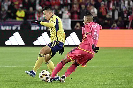 Feb 24, 2024; St. Louis, Missouri, USA; Seattle Sounders FC midfielder Joao Paulo (6) kicks the ball away from Real Salt Lake during the first half at CITYPARK. Mandatory Credit: Scott Rovak-USA TODAY Sports