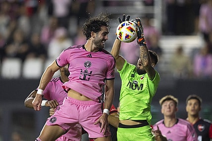 Feb 15, 2024; Fort Lauderdale, FL, USA; Inter Miami CF forward Leonardo Campana (8) attempts to connect a header against Newell   s Old Boys goalkeeper Lucas Hoyos (1) during the second half at DRV PNK Stadium. Mandatory Credit: Sam Navarro-USA TODAY Sports