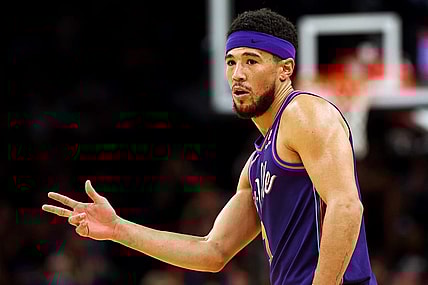 Feb 25, 2024; Phoenix, Arizona, USA; Phoenix Suns guard Devin Booker (1) reacts after a play during the first quarter of the game against the Los Angeles Lakers at Footprint Center. Mandatory Credit: Mark J. Rebilas-USA TODAY Sports