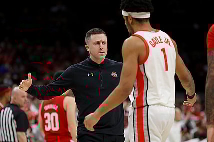 Feb 29, 2024; Columbus, Ohio, USA;  Ohio State Buckeyes head coach Jake Diebler congratulates guard Roddy Gayle Jr. (1) during the first half against the Nebraska Cornhuskers at Value City Arena. Mandatory Credit: Joseph Maiorana-USA TODAY Sports
