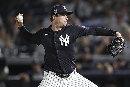 Mar 1, 2024; Tampa, Florida, USA;  New York Yankees starting pitcher Gerrit Cole (45) throws a pitch against the Toronto Blue Jays in the first inning at George M. Steinbrenner Field. Mandatory Credit: Nathan Ray Seebeck-USA TODAY Sports