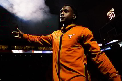 Texas Longhorns guard Max Abmas (3) gives out high-fives during the starting line-up announcement ahead of the Longhorns' game against the Oklahoma Sooners at the Moody Center in Austin, Saturday, March 9, 2024. Texas won the game 94-80.