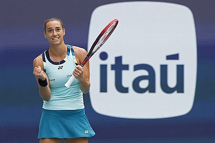 Mar 25, 2024; Miami Gardens, FL, USA; Caroline Garcia (FRA) celebrates after match point against Coco Gauff (USA) (not pictured) on day eight of the Miami Open at Hard Rock Stadium. Mandatory Credit: Geoff Burke-USA TODAY Sports