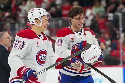 NHL: Montreal Canadiens at Carolina Hurricanes, juraj slafkovsky, ivan demidov