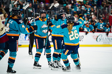 The New York Sirens celebrate a goal against the Montreal Victoire.