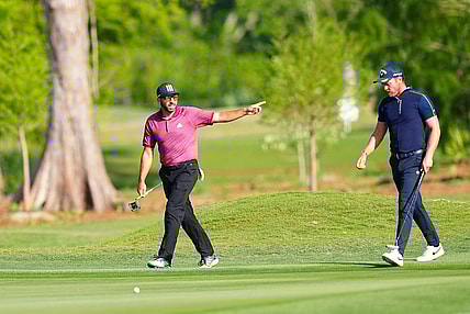 Apr 21, 2022; Avondale, Louisiana, USA; Sergio Garcia and Danny Willett walk on the 12th fairway during the first round of the Zurich Classic of New Orleans golf tournament. Mandatory Credit: Andrew Wevers-USA TODAY Sports