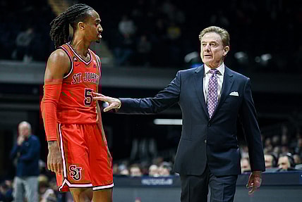 Feb 28, 2024; Indianapolis, Indiana, USA;  St. John's Red Storm guard Daniss Jenkins (5) talks with St. John's Red Storm head coach Rick Pitino during the second half at Hinkle Fieldhouse. Mandatory Credit: Robert Goddin-USA TODAY Sports