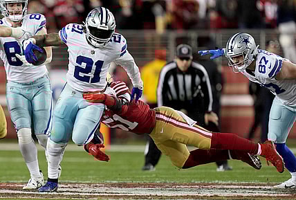 Jan 22, 2023; Santa Clara, California, USA; Dallas Cowboys running back Ezekiel Elliott (21) runs past San Francisco 49ers linebacker Azeez Al-Shaair (51) during the fourth quarter of a NFC divisional round game at Levi's Stadium. Mandatory Credit: Kyle Terada-USA TODAY Sports
