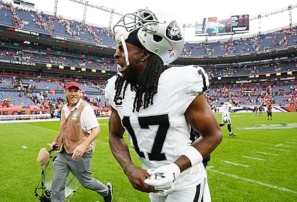 Sep 10, 2023; Denver, Colorado, USA; Las Vegas Raiders wide receiver Davante Adams (17) reacts following the win over the Denver Broncos at Empower Field at Mile High. Mandatory Credit: Ron Chenoy-USA TODAY Sports