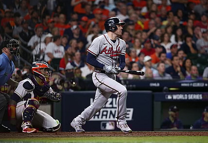Nov 2, 2021; Houston, TX, USA; Atlanta Braves first baseman Freddie Freeman (5) hits a solo home run against the Houston Astros during the seventh inning in game six of the 2021 World Series at Minute Maid Park. Mandatory Credit: Troy Taormina-USA TODAY Sports