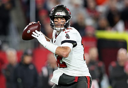Jan 16, 2023; Tampa, Florida, USA; Tampa Bay Buccaneers quarterback Tom Brady (12) drops back to pass against the Dallas Cowboys during a wild card game at Raymond James Stadium. Mandatory Credit: Nathan Ray Seebeck-USA TODAY Sports