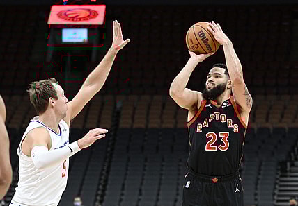 Dec 31, 2021; Toronto, Ontario, CAN; Toronto Raptors guard Fred VanVleet (23) shoots the ball against Los Angeles Clippers guard Luke Kennard (5) in the first half at Scotiabank Arena. Mandatory Credit: Dan Hamilton-USA TODAY Sports