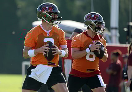 Jul 30, 2023; Tampa, FL, USA; Tampa Bay Buccaneers quarterback Kyle Trask (2) and Tampa Bay Buccaneers quarterback Baker Mayfield (6) work out during training camp at AdventHealth Training Center. Mandatory Credit: Kim Klement-USA TODAY Sports