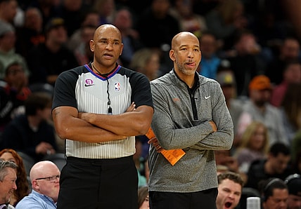 Jan 19, 2023; Phoenix, Arizona, USA; Phoenix Suns head coach Monty Williams (right) alongside NBA referee Kevin Cutler against the Brooklyn Nets at Footprint Center. Mandatory Credit: Mark J. Rebilas-USA TODAY Sports