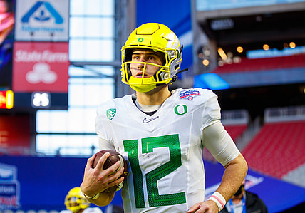Jan 2, 2021; Glendale, AZ, USA; Oregon Ducks quarterback Tyler Shough (12) against the Iowa State Cyclones in the Fiesta Bowl at State Farm Stadium. Mandatory Credit: Mark J. Rebilas-USA TODAY Sports