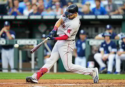 Aug 5, 2022; Kansas City, Missouri, USA; Boston Red Sox first baseman Eric Hosmer (35) hits an RBI double against the Kansas City Royals during the second inning at Kauffman Stadium. Mandatory Credit: Jay Biggerstaff-USA TODAY Sports