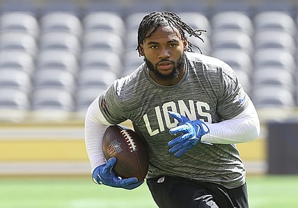 Aug 28, 2022; Pittsburgh, Pennsylvania, USA;  Detroit Lions running back D'Andre Swift (32) warms up before the game against the Pittsburgh Steelers at Acrisure Stadium. Mandatory Credit: Charles LeClaire-USA TODAY Sports