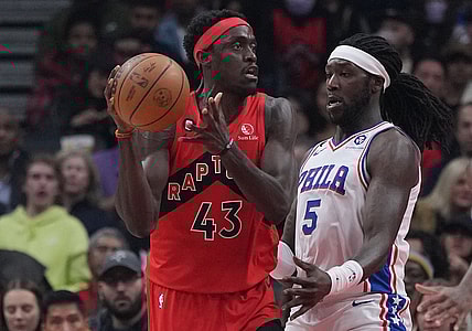 Oct 28, 2022; Toronto, Ontario, CAN; Toronto Raptors forward Pascal Siakam (43) controls the ball as Philadelphia 76ers center Montrezl Harrell (5) tries to defend during the first quarter at Scotiabank Arena. Mandatory Credit: Nick Turchiaro-USA TODAY Sports