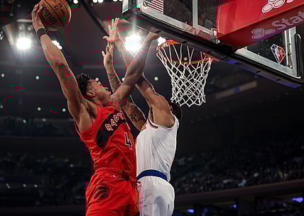 Apr 10, 2022; New York, New York, USA; Toronto Raptors forward Scottie Barnes (4) drives to the basket against New York Knicks forward Obi Toppin (1) during the first half at Madison Square Garden. Mandatory Credit: Vincent Carchietta-USA TODAY Sports