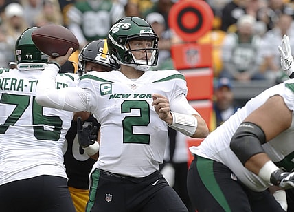 Oct 2, 2022; Pittsburgh, Pennsylvania, USA;  New York Jets quarterback Zach Wilson (2) passes against the Pittsburgh Steelers during the first quarter at Acrisure Stadium. Mandatory Credit: Charles LeClaire-USA TODAY Sports
