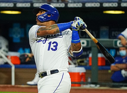 Sep 24, 2020; Kansas City, Missouri, USA; Kansas City Royals catcher Salvador Perez (13) hits a home run against the Detroit Tigers at Kauffman Stadium. Mandatory Credit: Jay Biggerstaff-USA TODAY Sports