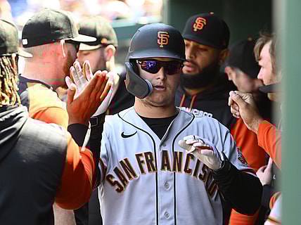 Apr 24, 2022; Washington, District of Columbia, USA; San Francisco Giants right fielder Joc Pederson (23) is congratulated by teammates after hitting an RBI sacrifice fly against the Washington Nationals during the second inning at Nationals Park. Mandatory Credit: Brad Mills-USA TODAY Sports