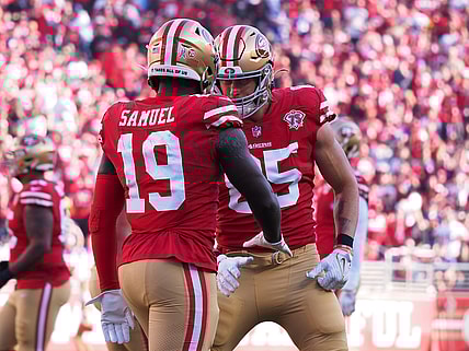 Nov 28, 2021; Santa Clara, California, USA; San Francisco 49ers wide receiver Deebo Samuel (19) celebrates with tight end George Kittle (85) after scoring a touchdown against the Minnesota Vikings during the first quarter at Levi's Stadium. Mandatory Credit: Kelley L Cox-USA TODAY Sports