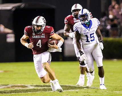 Sep 25, 2021; Columbia, South Carolina, USA; South Carolina Gamecocks quarterback Luke Doty (4) scrambles against the Kentucky Wildcats in the fourth quarter at Williams-Brice Stadium. Mandatory Credit: Jeff Blake-USA TODAY Sports
