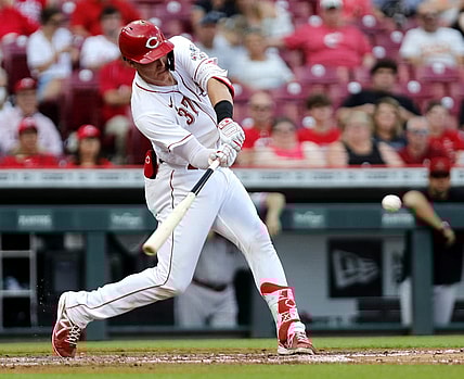 Jun 7, 2022; Cincinnati, Ohio, USA; Cincinnati Reds catcher Tyler Stephenson (37) hits an RBI single against the Arizona Diamondbacks during the second inning at Great American Ball Park. Mandatory Credit: David Kohl-USA TODAY Sports