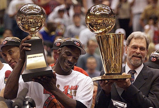Michael Jordan and Phil Jackson celebrate after finishing off the Jazz to win the 1998 championship.

2020-04-16 Jordan Jackson