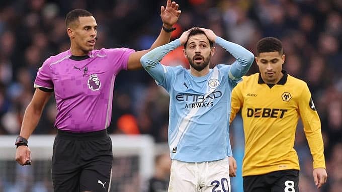 Debutant referee Farai Hallam defied VAR to deny Man City a penalty against Wolves