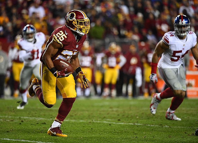 Jan 1, 2017; Landover, MD, USA; Washington Redskins running back Chris Thompson (25) rushes the ball against the New York Giants during the second half at FedEx Field. Mandatory Credit: Brad Mills-USA TODAY Sports