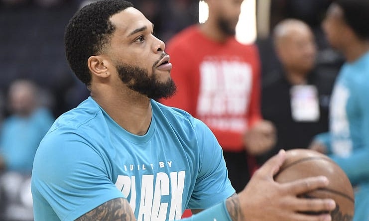 Feb 7, 2024; Charlotte, North Carolina, USA; Charlotte Hornets forward Miles Bridges (0) warms up before the game against the Toronto Raptors at the Spectrum Center. Mandatory Credit: Sam Sharpe-USA TODAY Sports