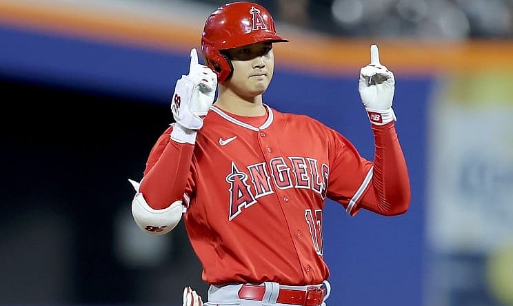 Shohei Ohtani reacts after hitting a double.