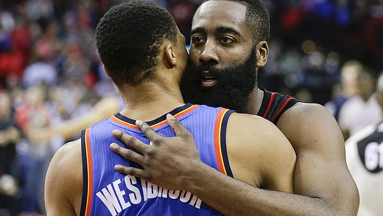 Jan 5, 2017; Houston, TX, USA; Houston Rockets guard James Harden (13) hugs Oklahoma City Thunder guard Russell Westbrook (0) after the Rockets defeated the City Thunder at Toyota Center. Houston Rockets won 118 to 116. Mandatory Credit: Thomas B. Shea-USA TODAY Sports