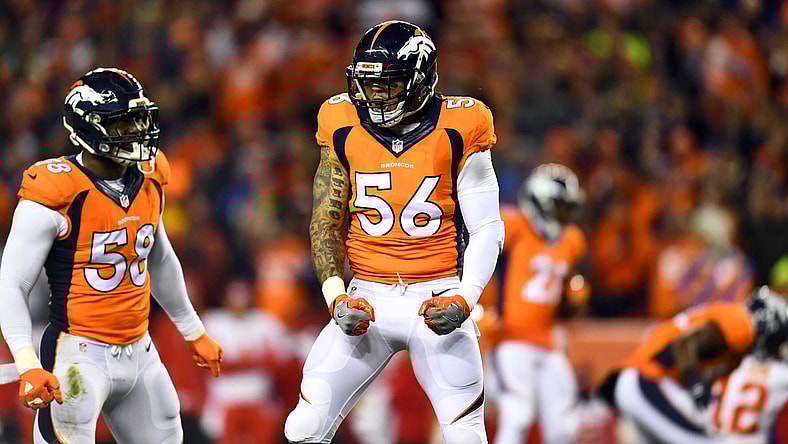 Nov 27, 2016; Denver, CO, USA; Denver Broncos outside linebacker Von Miller (58) and outside linebacker Shane Ray (56) react to a defensive stop in the first quarter against the Kansas City Chiefs at Sports Authority Field at Mile High. Mandatory Credit: Ron Chenoy-USA TODAY Sports