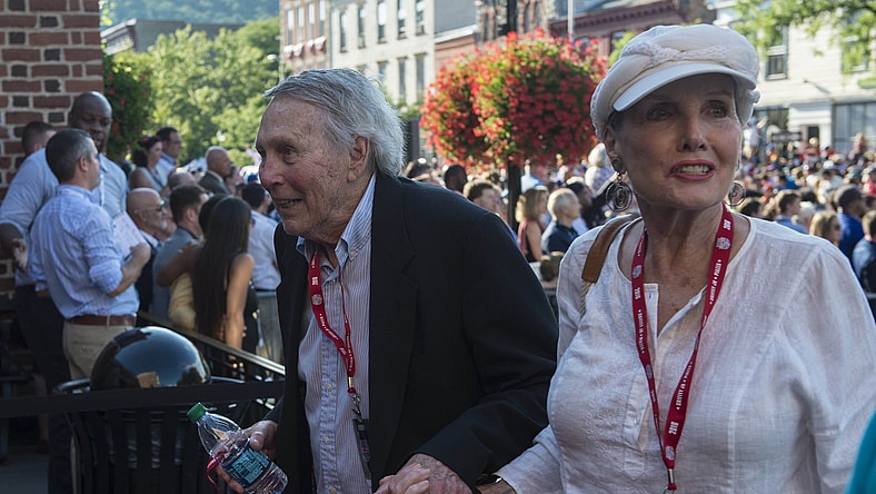 Caption: Jul 23, 2016; Cooperstown, NY, USA; Hall of Famer Brooks Robinson and his wife arrive at National Baseball Hall of Fame during the MLB baseball hall of fame parade of legends. Mandatory Credit: Gregory J. Fisher-USA TODAY Sports