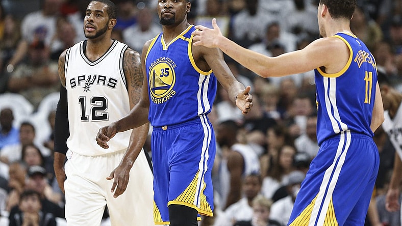 May 20, 2017; San Antonio, TX, USA; Golden State Warriors forward Kevin Durant (35) celebrates with guard Klay Thompson (11) after a play during the first quarter against the San Antonio Spurs in game three of the Western conference finals of the NBA Playoffs at AT&T Center. Mandatory Credit: Troy Taormina-USA TODAY Sports