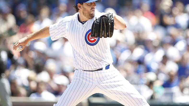Cubs starter John Lackey hits four batters in his start Tuesday.