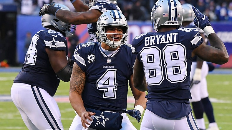 Cowboys celebrate with quarterback Dak Prescott
